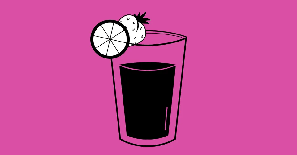 Pink cocktail glass with black drink and two lime slices on top