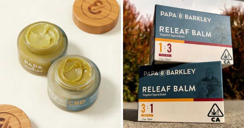 Two small balm jars and two Papa & Barkley Relief Balm boxes in gold, blue, and white packaging.
