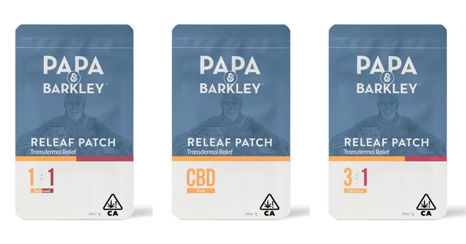 Three Papa & Barkley Relief Patch packages in white, blue, and orange on a light background