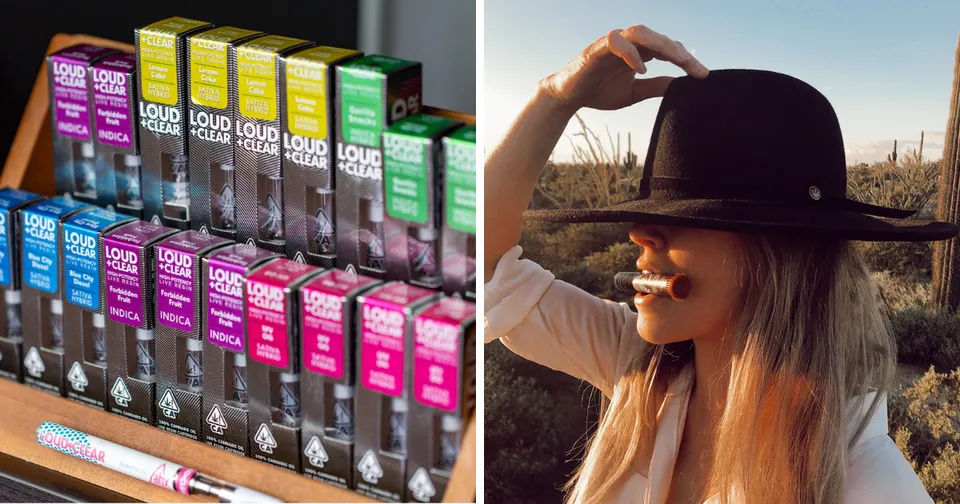 Colorful vape cartridges displayed on shelves beside a woman smoking in a black hat outdoors