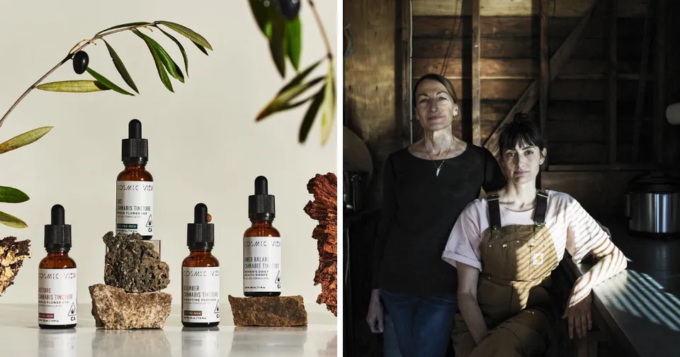 Amber dropper bottles with dried herbs on a marble counter; two people stand in a dim rustic room.