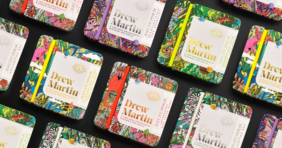 Colorful patterned journals arranged diagonally, with white labels reading “Inspire” and “Create”